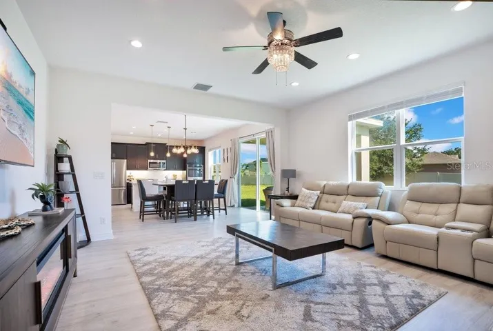 The generously-sized Family Room is ideal for relaxing or hosting guests.
