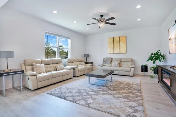 The generously-sized Family Room is ideal for relaxing or hosting guests.
