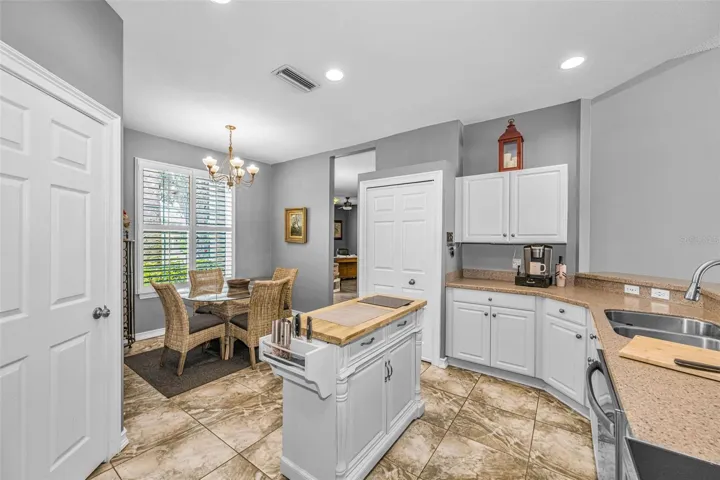 Inside Laundry Room is adjacent to the kitchen