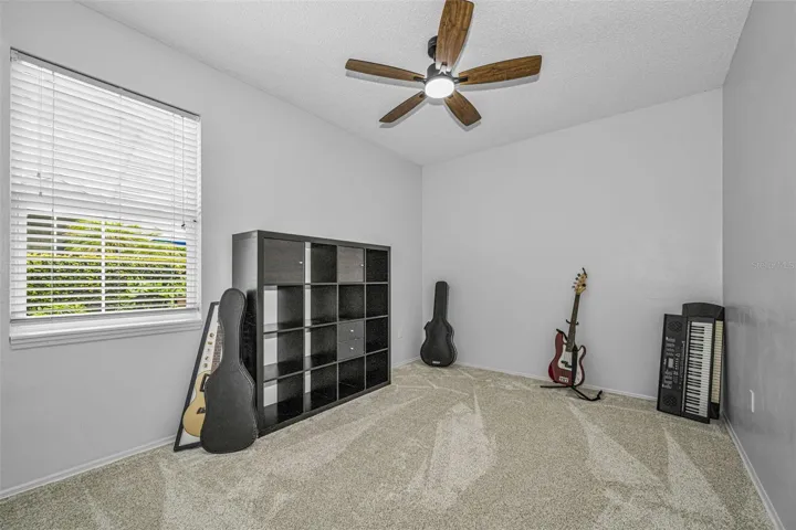 Bedroom #4 is separate in the 3 way split plan, perfect for in-law privacy