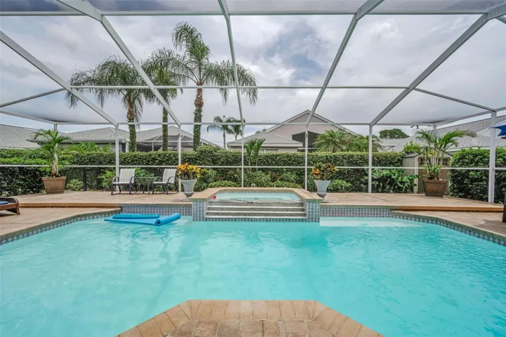 Overflow spa, heated pool and screened lanai