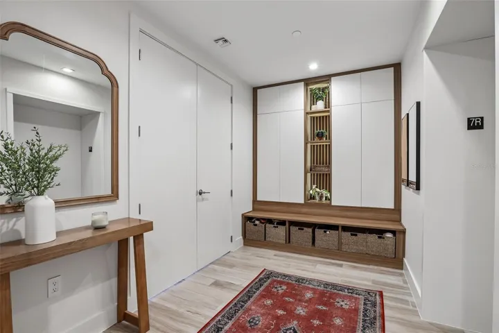 Private foyer entry with built-in storage