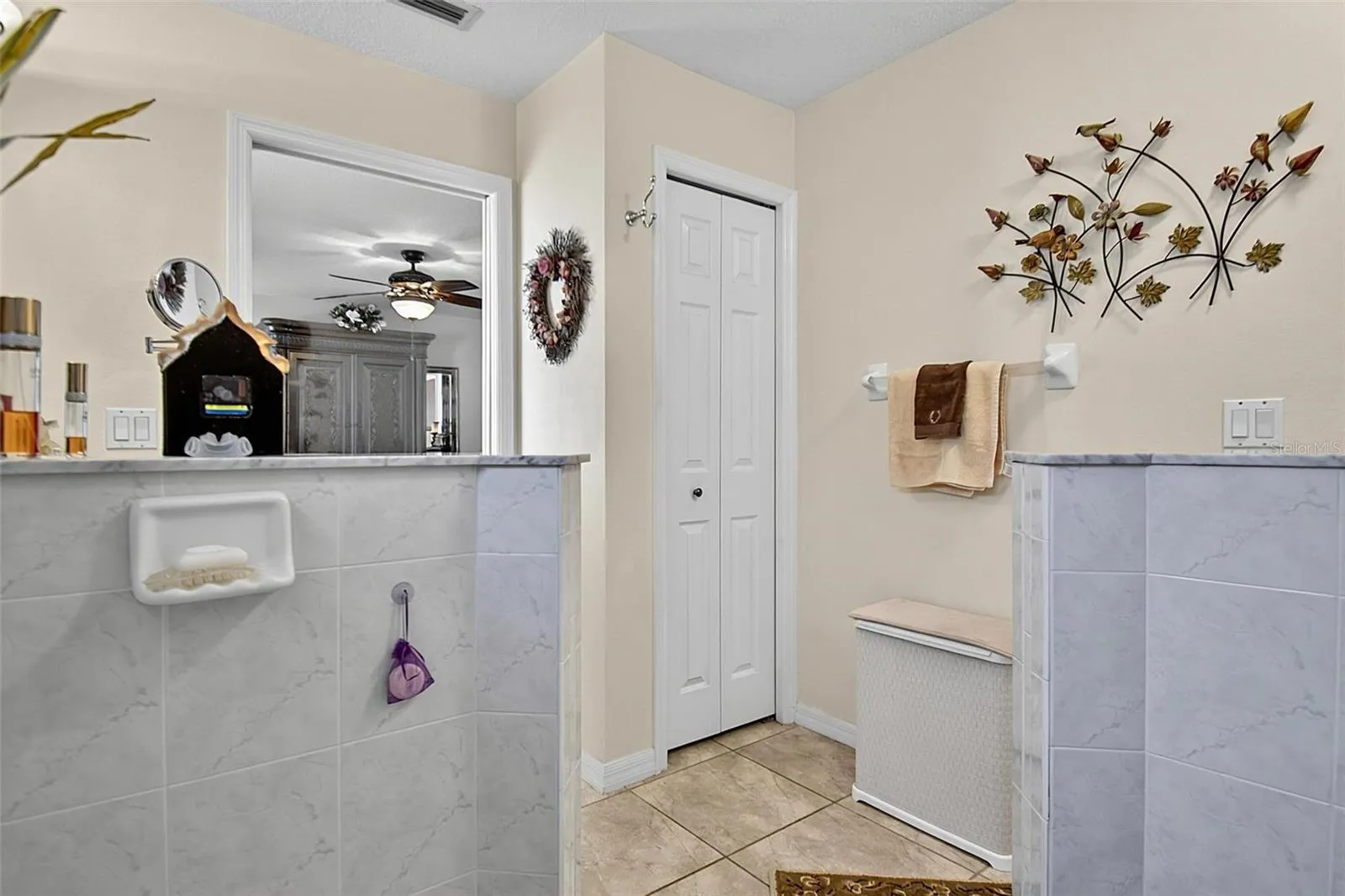View from primary shower of linen closet