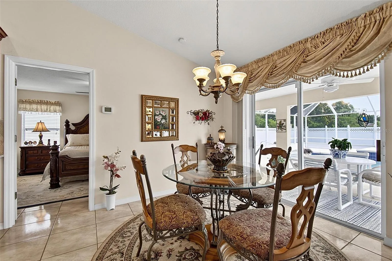 Dinette with view into primary bedroom