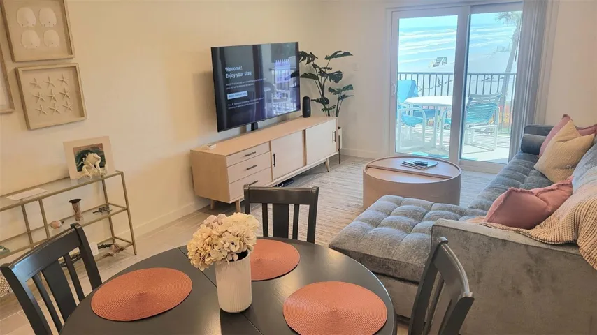 View from Dinning Area to Living Room and Balcony and Ocean