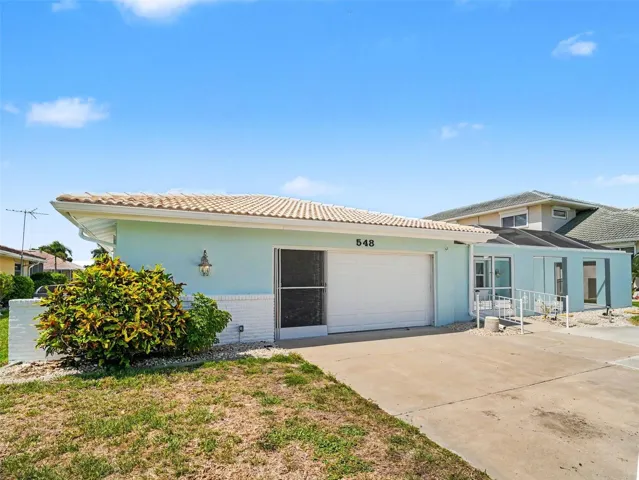 Home from left side, oversized garage