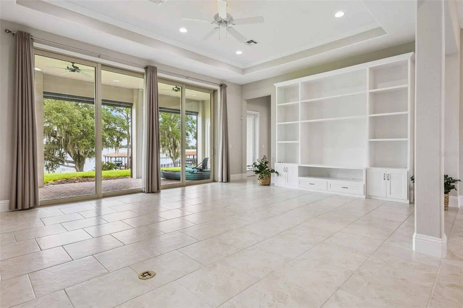 Soaring 12' Ceilings with Immediate Lake Views