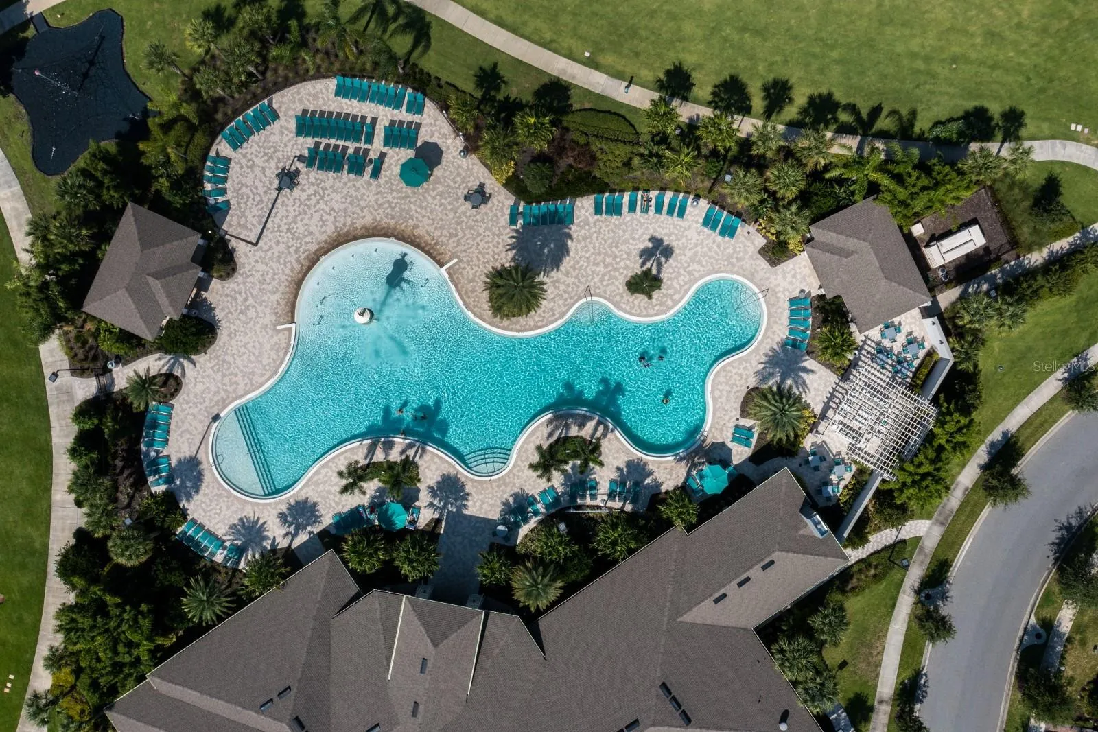 Large Pool Located in Center of Community