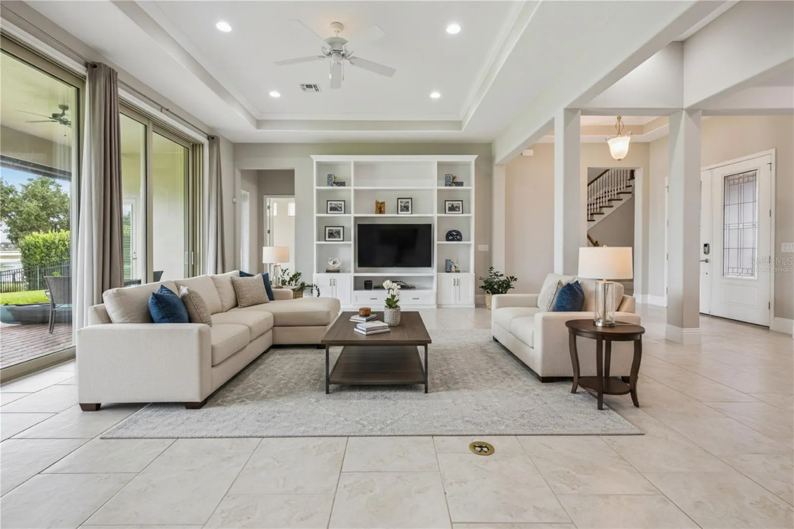 Virtually Staged - Grand Family Room with Custom Built In