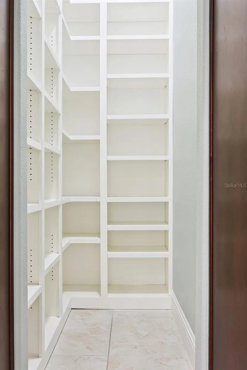 Secret Pantry with Custom Shelving