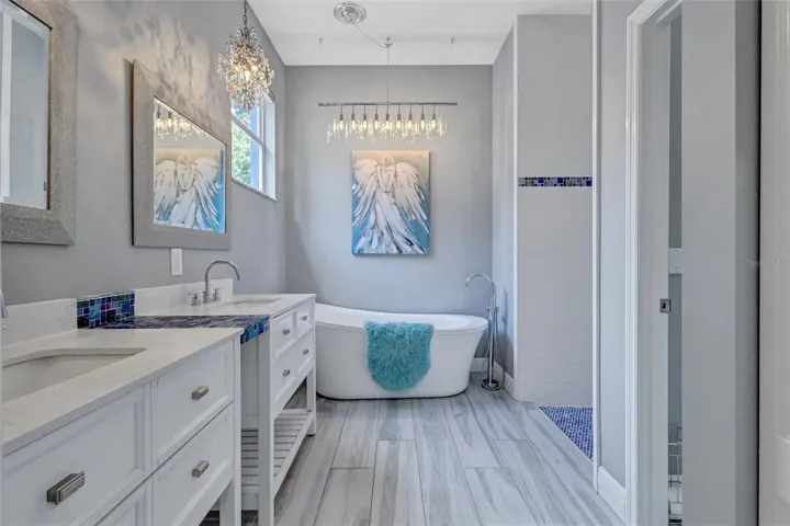 Primary Bathroom with Stand Alone Soaking Tub and Double Vanity