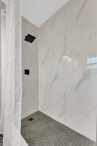 The walk-in shower in the en-suite bathroom