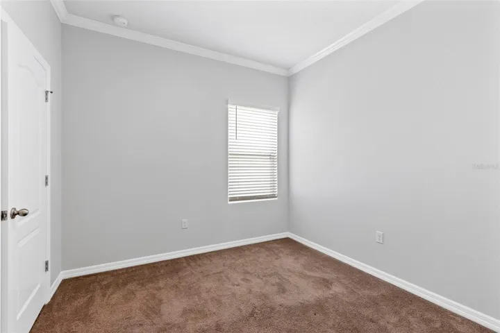 Bedroom 3 offers crown molding
