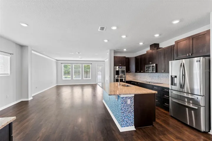 Kitchen is open to dining area and family room perfect for entertaining!