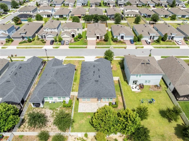 Subject aerial backyard - extended new patio with pavers and footers for future enclosure