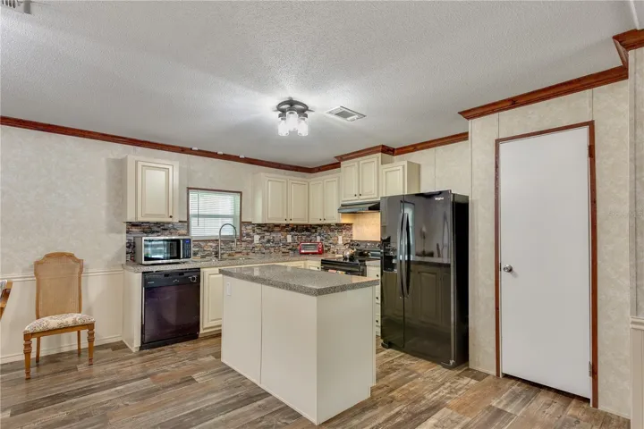 Kitchen Island for extra prep and seating/Pantry