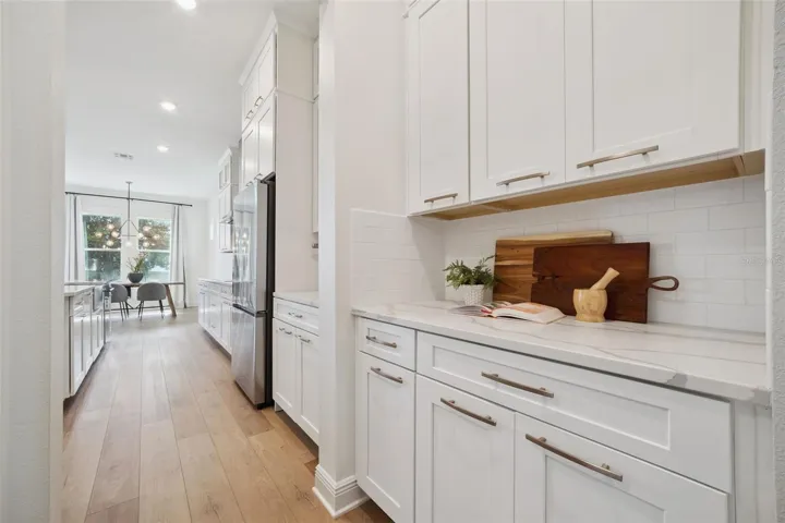 Butler pantry connects to Dining room
