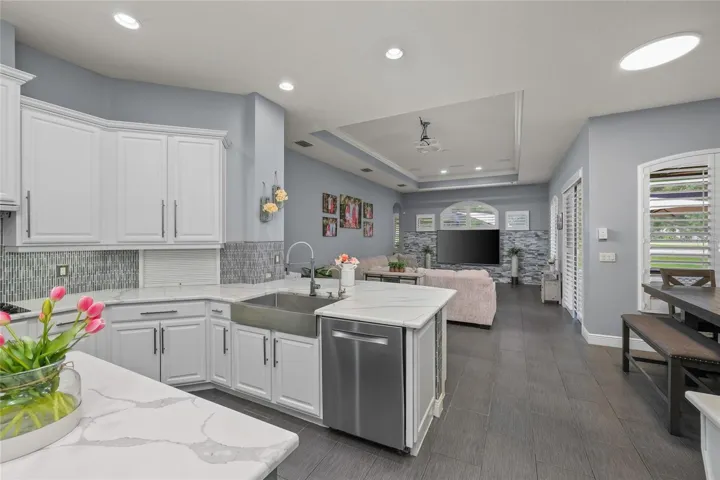 This Kitchen has quartz countertops and tons of storage