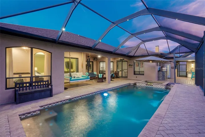Resort-style pool with expansive outdoor living space