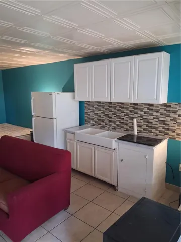studio with kitchenette