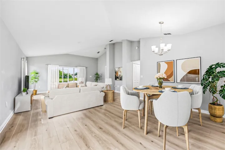 Virtually staged dining/living rooms