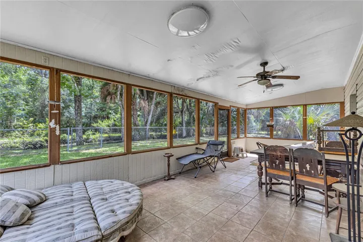 Back Screened Porch by Canal
