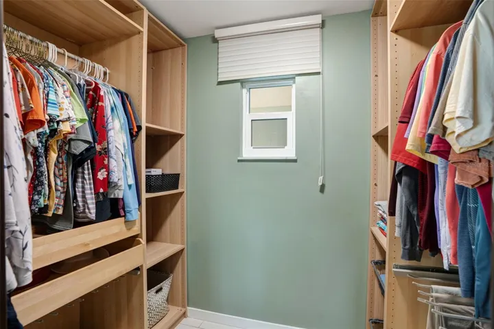 Primary walk-in custom closet