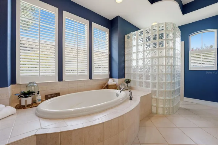 Primary Bath with dual sinks, garden tub and large walk-in shower.