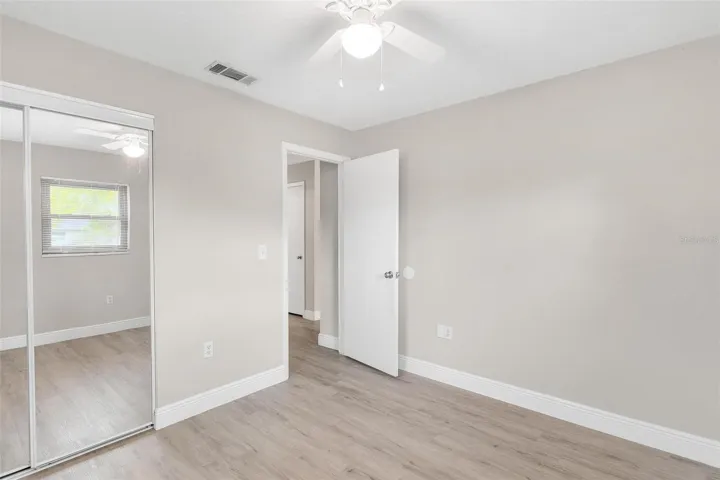 Bedroom 3 with large wall closet & Decorative Mirrored Door