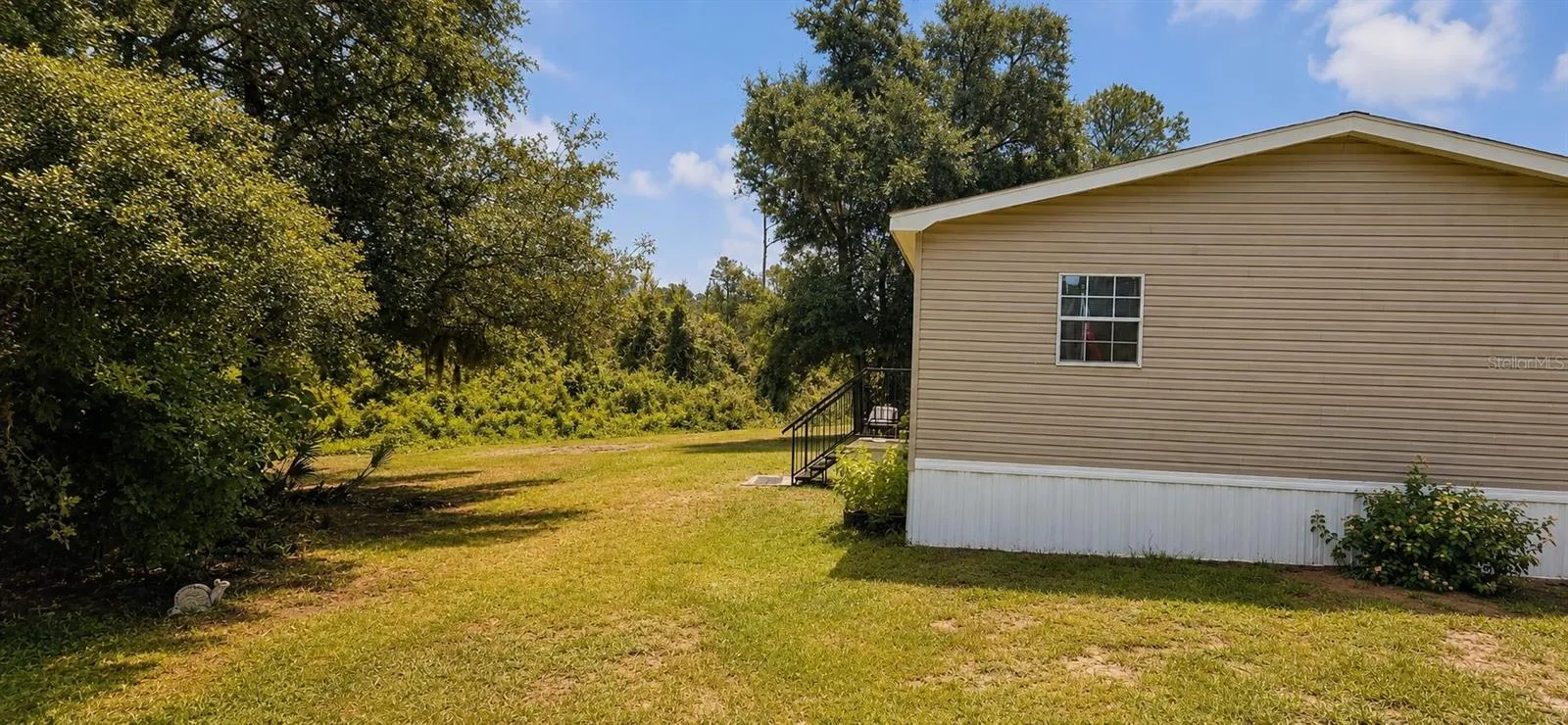 Room for outdoor hobbies, equipment, recreation, and country living freedom.