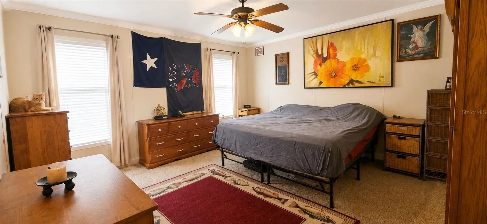 Spacious primary bedroom offering comfort, privacy, and natural light.