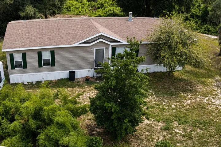 Private country homestead surrounded by mature trees and natural beauty.