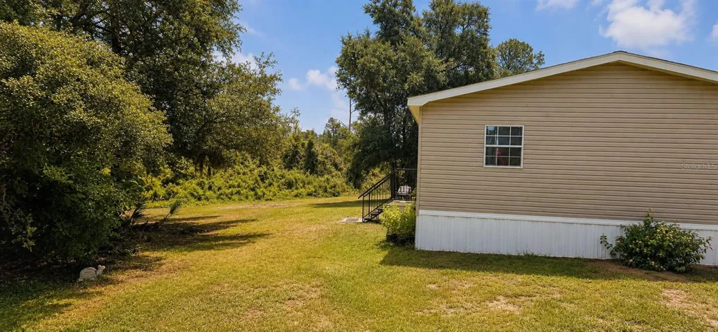 Room for outdoor hobbies, equipment, recreation, and country living freedom.
