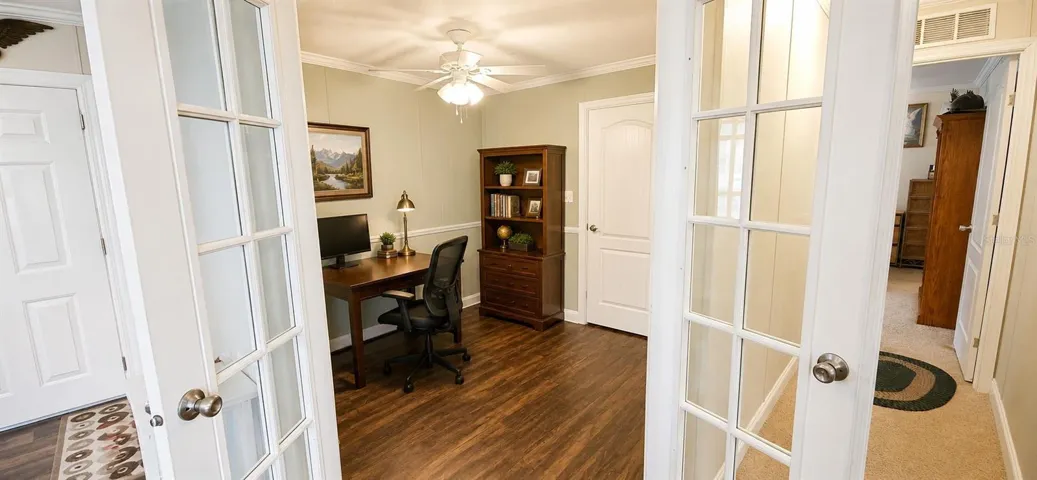 WORK FROM HOME office with French doors and peaceful surroundings.