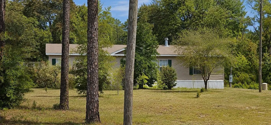 Private HOMESITE surrounded by towering pines, native oaks, and wildlife.