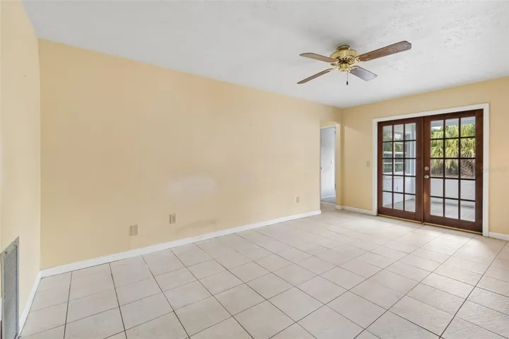 Family room with double glass door acces to your outdoor entertaining area.