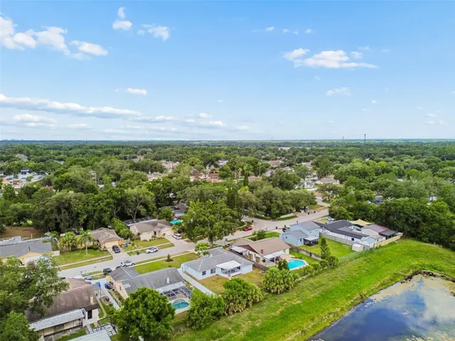 Your home has a large fenced yard with a pond behind the property.