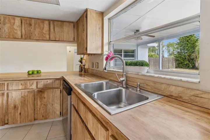 Your kitchen offers a pass through window to the patio for easy transfers for drinks and food.