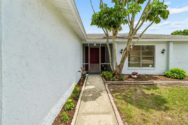 Your home features a front screened patio.