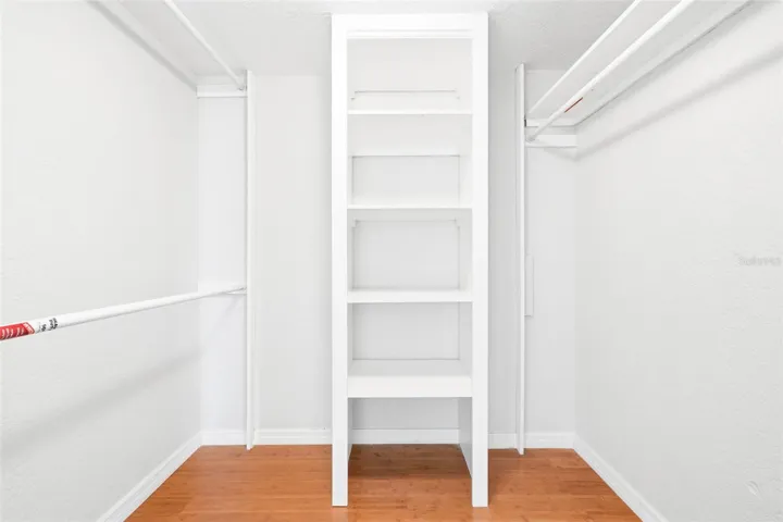 Walk in closet primary bedroom