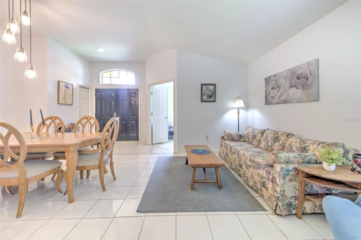 View of Formal living and dining facing front entrance