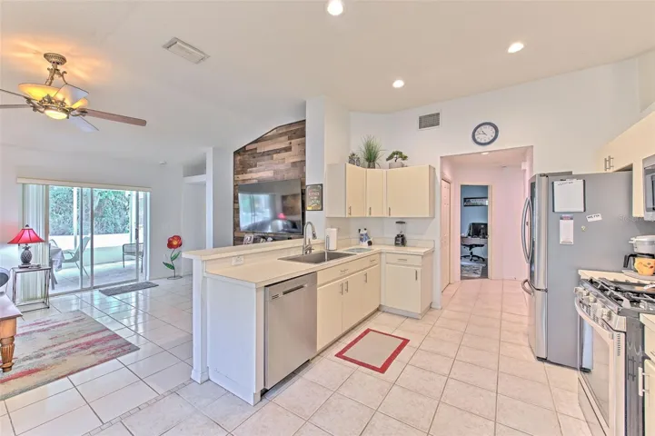 Looking towards kitchen and secondary bedroom
