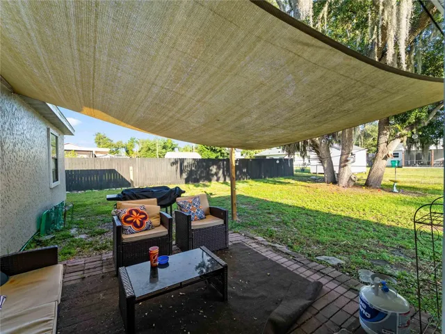 CoveredPatio_1018RedBayTer_PortCharlotte_ShadeCanopy_LanaiView.jpg