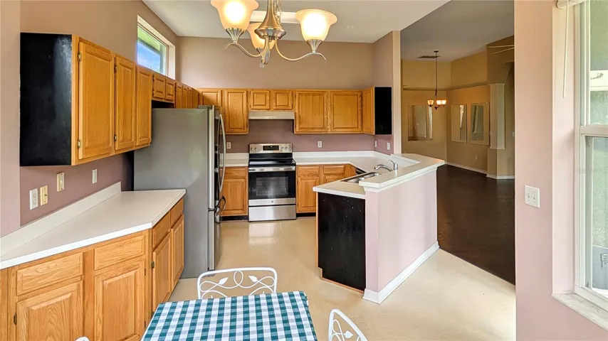 Bright, Airy KITCHEN Open to Living Areas!  •Home is in Excellent Condition, Owned by the ORIGINAL OWNER since the Home was Built in 1997!