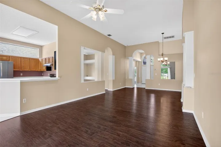 View of Living Room and Dining Room as seen from Back Porch!  •Home is in Excellent Condition, Owned by the ORIGINAL OWNER since the Home was Built in 1997!