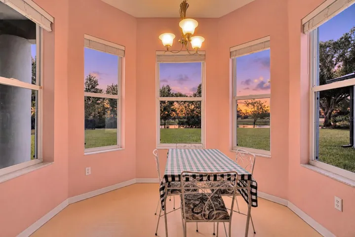 View from Kitchen of your Sprawling Backyard...and..the  LAKEFRONT ...AND... the GOLFRONT!