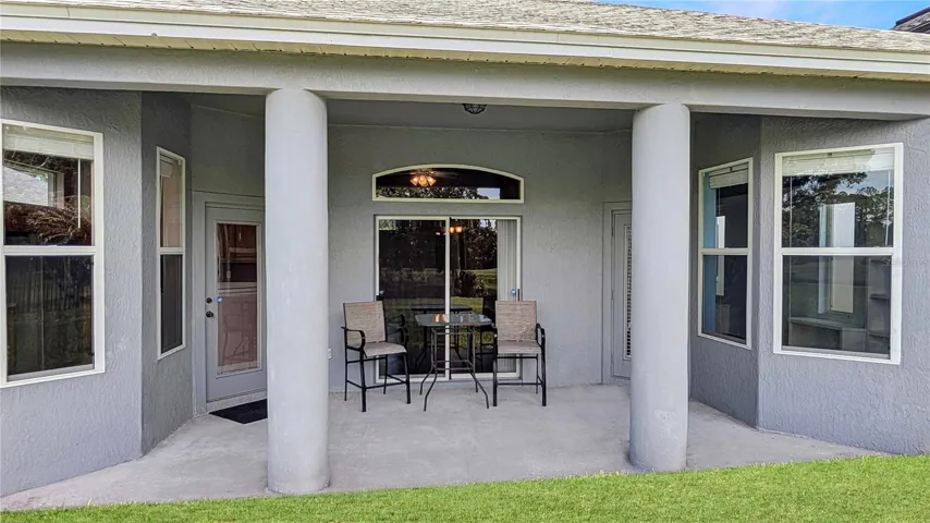 Your Covered Lanai that Overlooks Your Sprawling Green LAWN that goes on without end...and the LAKE...and the GOLF COURSE!