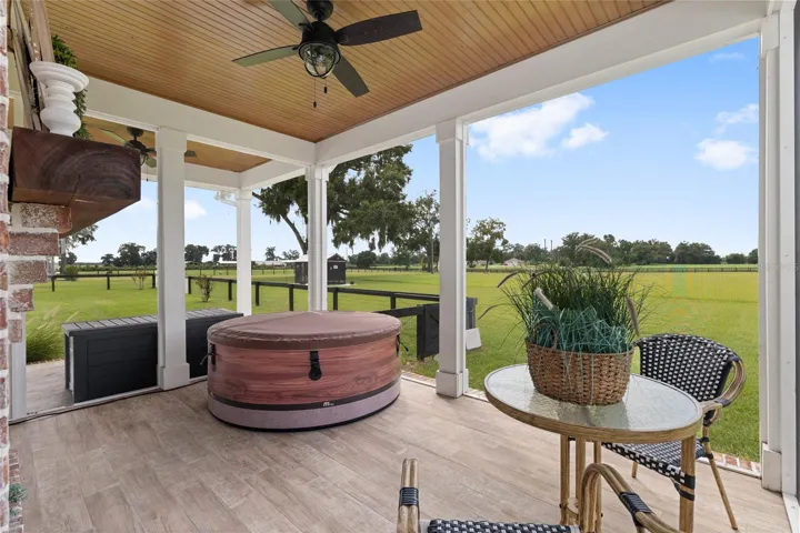 Screened porch adjacent to primary bedroom.