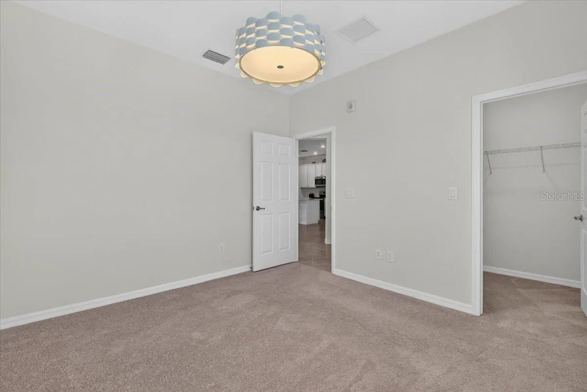 Second Bedroom with a small walk-in closet