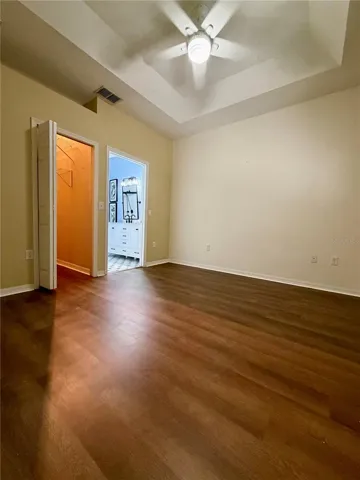 primary bedroom with walk in closet